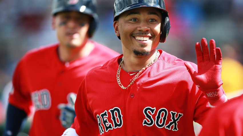 02/29/16: Fort Myers, FL: Red Sox outfielder Mookie Betts is all smiles after hitting a three run home run vs. BC. The Red Sox played their first two games of the exhibition season, taking part in two seven inning games vs. Boston College and Northeastern University at Jet Blue Park. (Globe Staff Photo/Jim Davis) section:sports topic:spring training