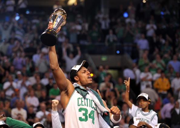Boston Celtics' Paul Pierce celebrates with his MVP trophy after winning Game 6 of the 2008 NBA Finals in Boston, Massachusetts, June 17, 2008. The Boston Celtics captured the National Basketball Association championship, routing the Los Angeles Lakers 131-92 to win the best-of-seven NBA Finals four games to two. AFP PHOTO / GABRIEL BOUYS (Photo credit should read GABRIEL BOUYS/AFP/Getty Images)