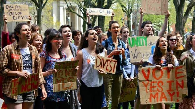 Students associated with the group Brown Divest Coal protested in front of the Brown University president's office during a rally May 3. The group is demanding that the university stop investing in certain oil and coal companies.